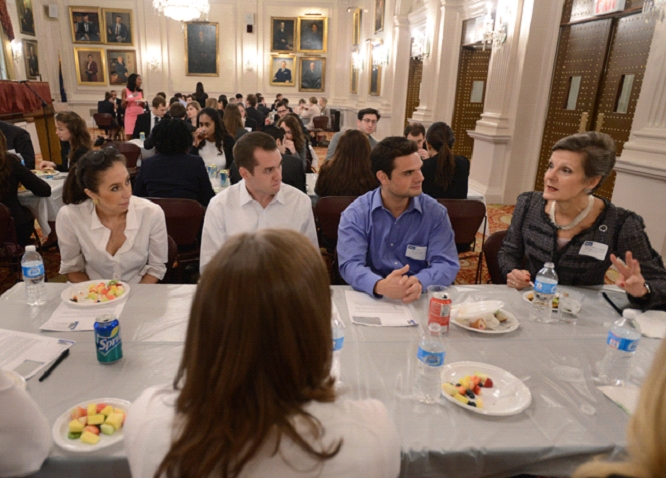 A large group of people at a luncheon.